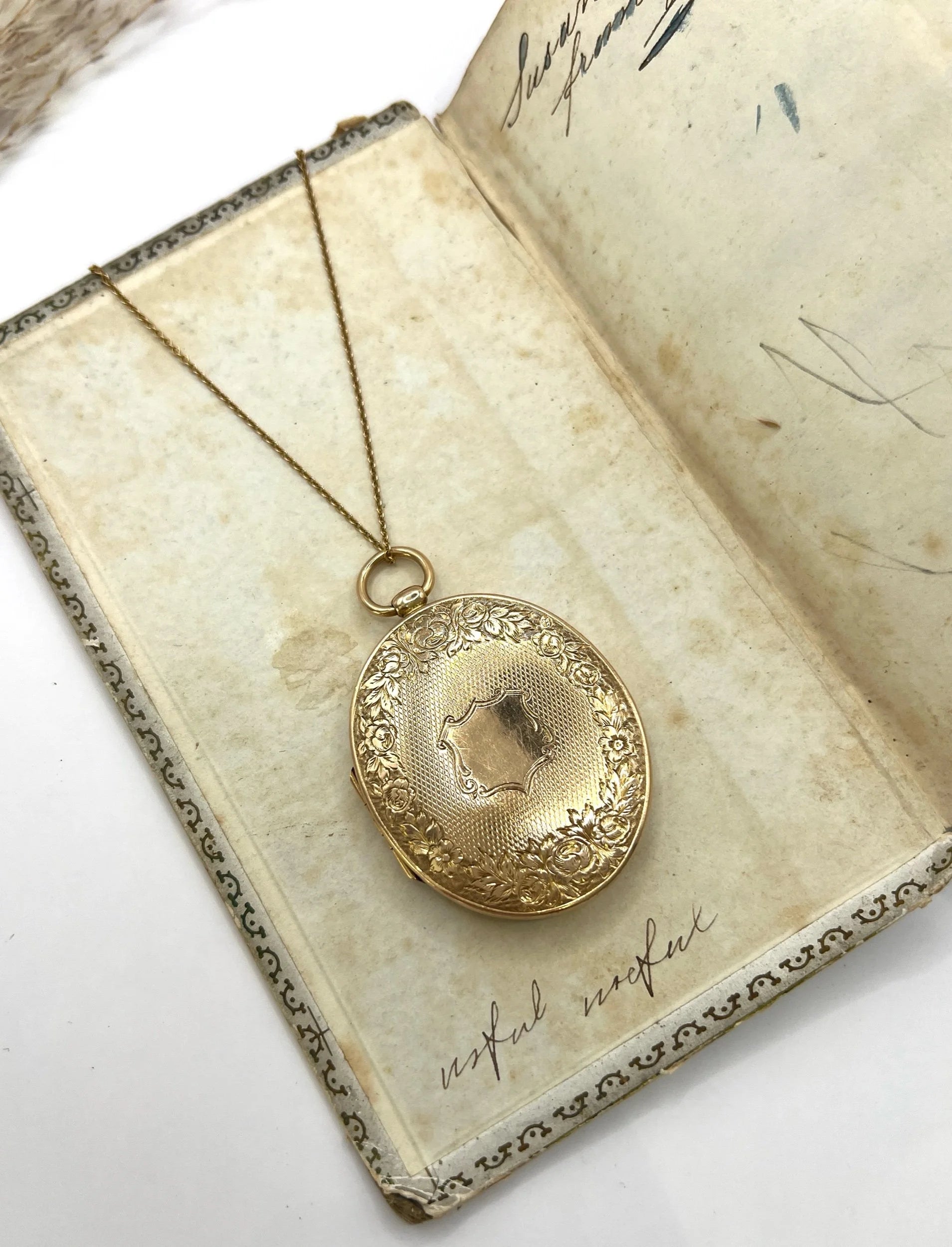 Victorian 15 Carat Yellow Gold Large Floral Engraved Oval Locket, Circa 1880