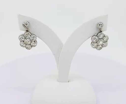 Daisy Diamond Cluster Drop Earrings; pair of flower cluster earrings set with brilliant-cut diamonds, 1.95 carat total, 18ct white gold