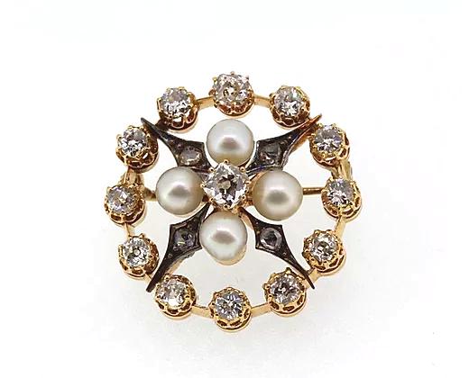 Antique Natural Pearl and Old Cut Diamond Brooch; circular brooch set with old cut diamonds and natural pearls, in silver and high carat gold