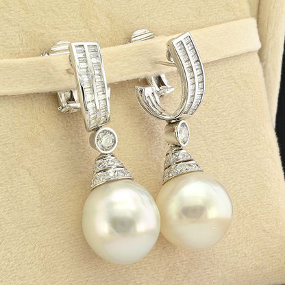 South Sea Pearl and 3.70ct Diamond Drop Earrings by Ella Gem, Two large South Sea pearls with diamond caps suspended from baguette diamond tops via diamond solitaire links in 18ct white gold