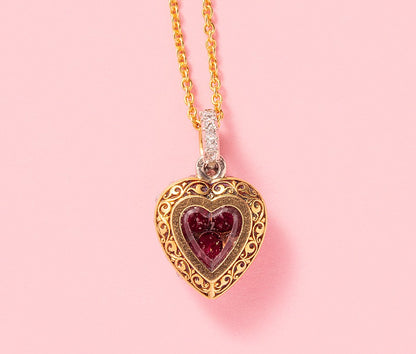 An Early 20th Century 18ct Ruby & Diamond Heart Locket