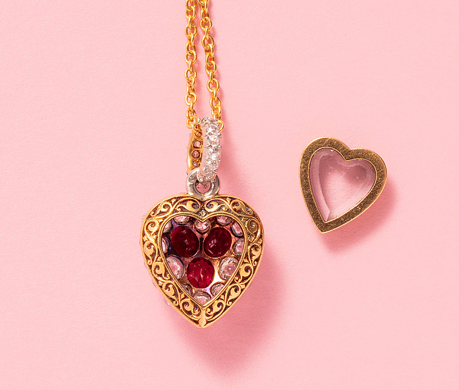 An Early 20th Century 18ct Ruby & Diamond Heart Locket