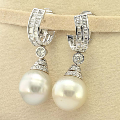 South Sea Pearl and 3.70ct Diamond Drop Earrings by Ella Gem, Two large South Sea pearls with diamond caps suspended from baguette diamond tops via diamond solitaire links in 18ct white gold