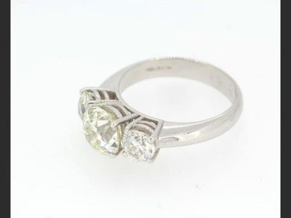 Trilogy Diamond Ring, totaling 4.57 carats