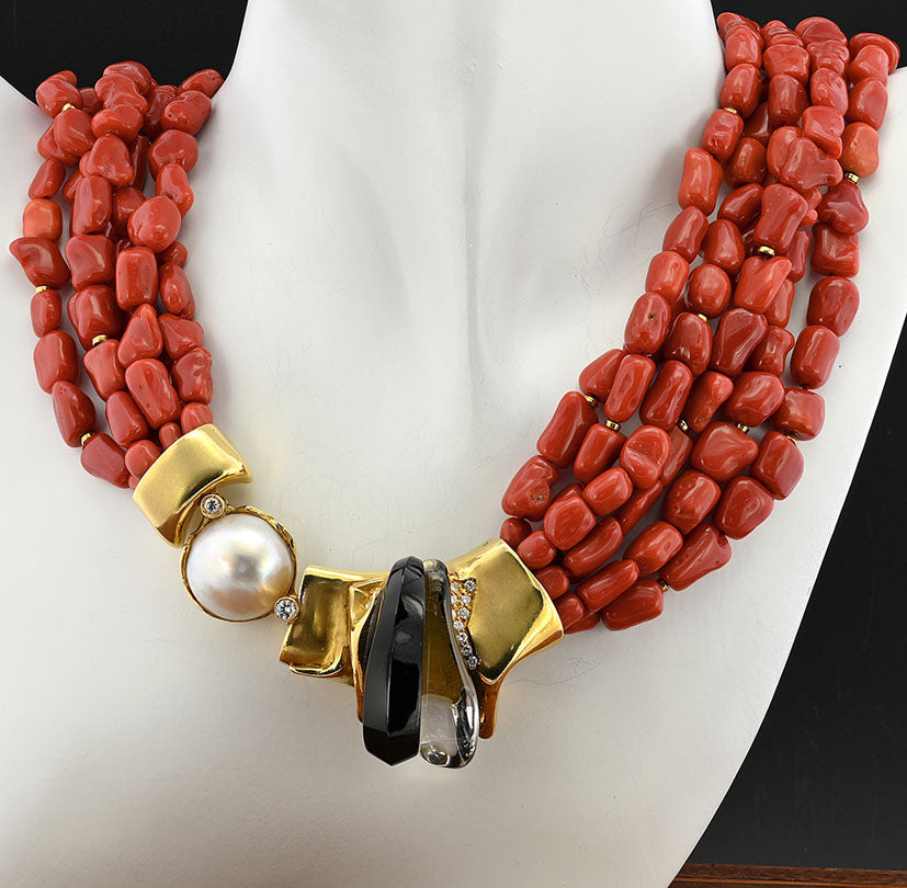Misani Milano Natural Red Sardinia Coral Necklace, 6 intertwined strands of natural Italian Red Sardinia coral with 18ct yellow gold clasp set with diamonds, mabe pearl, black onyx and rock crystal, Circa 1980