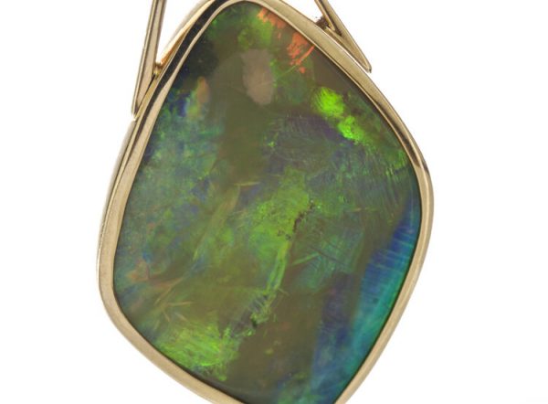 Vintage 25.00ct Opal Pendant in 18ct Yellow Gold; striking 25 carat opal of cushioned diamond shaped form, in 18ct yellow gold, Circa 1950-1970s