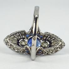 Vintage French Sapphire, Diamond and Platinum Cocktail Ring; set with 1.25cts sapphires and 0.80cts old European-cut diamonds, maker’s mark for Jean Jorens