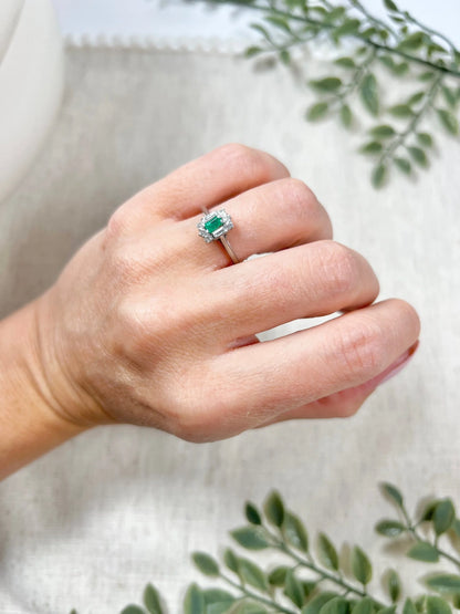 Vintage 18 Carat White Gold Emerald Cut Emerald and Diamond Cluster Ring, Circa 1940