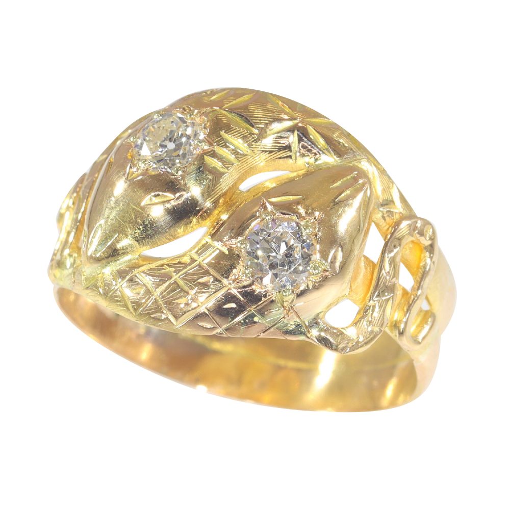 Antique serpent diamond ring in gold.