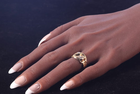 Antique serpent diamond ring in gold.