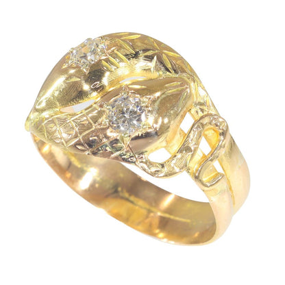 Antique serpent diamond ring in gold.