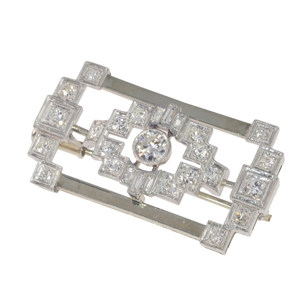 Vintage diamond brooch in platinum and white gold.