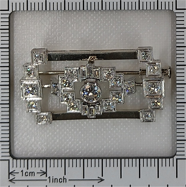 Vintage diamond brooch in platinum and white gold.
