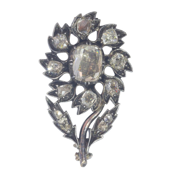Antique diamond brooch in silver and rose gold.