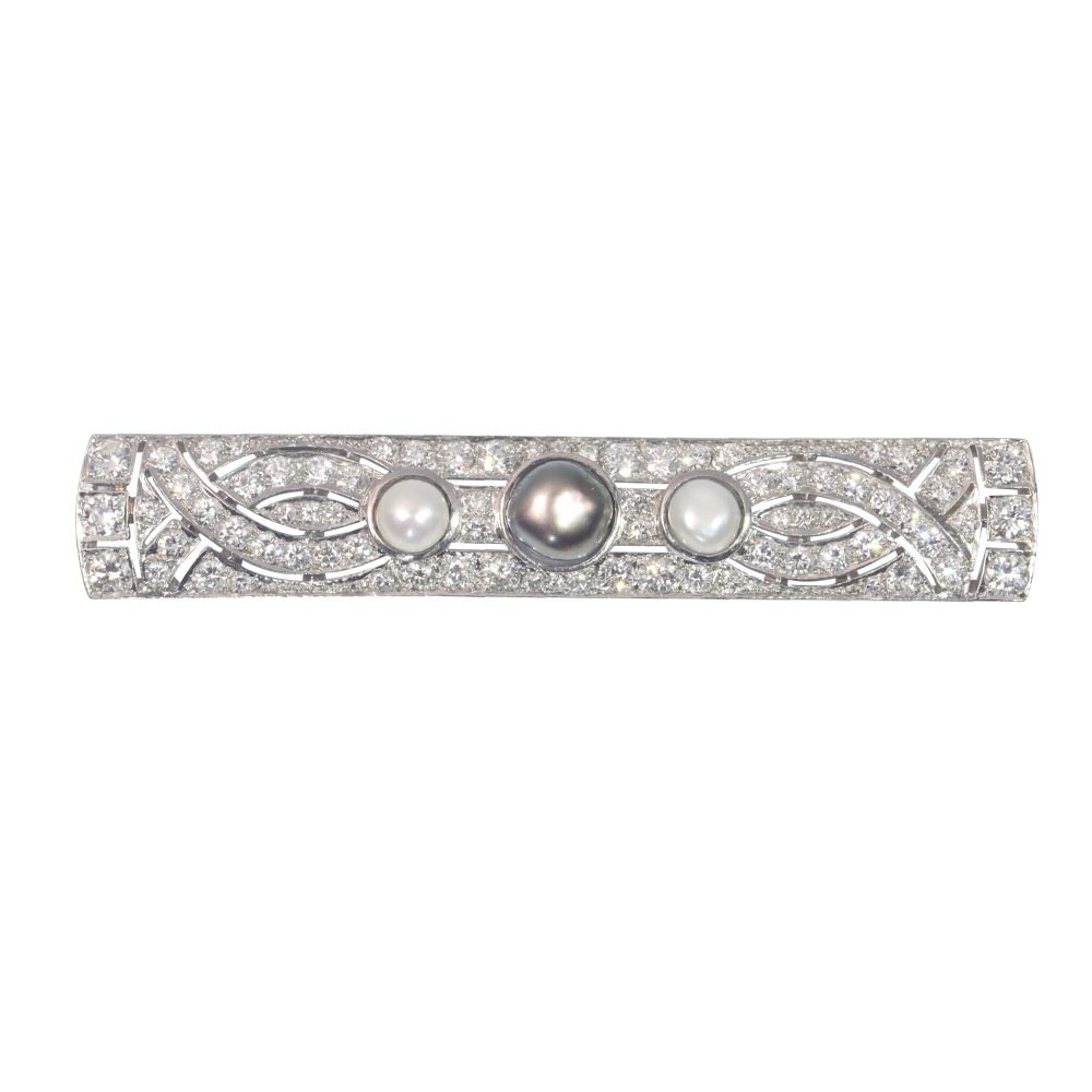 Vintage 3.28ct Diamond and Pearl Brooch in Platinum, three central pearls surrounded by 3.28 carats of sparkling modern round brilliant-cut and single-cut diamonds. Mid 20th century Circa 1950s