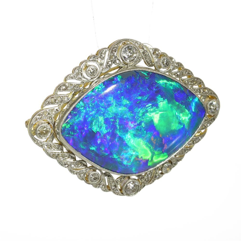 Antique 24 ct Black Opal Brooch Surrounded by Diamonds Set In 18ct Gold