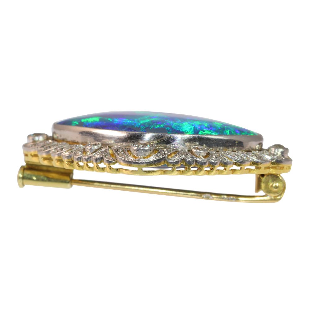 Antique 24 ct Black Opal Brooch Surrounded by Diamonds Set In 18ct Gold