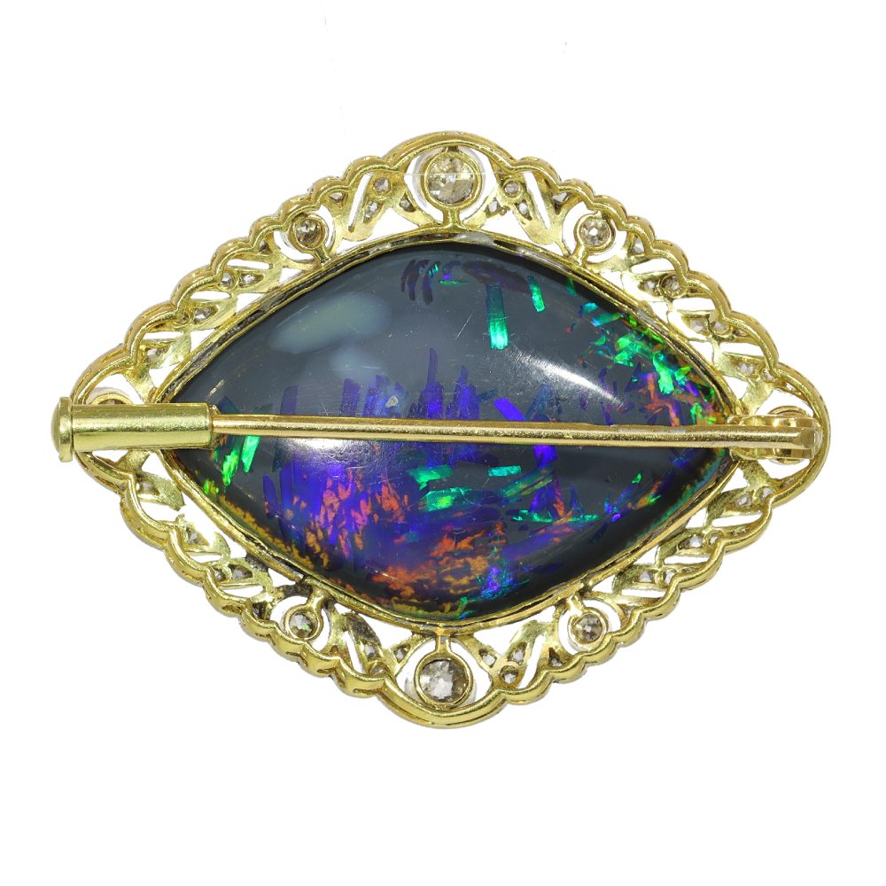 Antique 24 ct Black Opal Brooch Surrounded by Diamonds Set In 18ct Gold