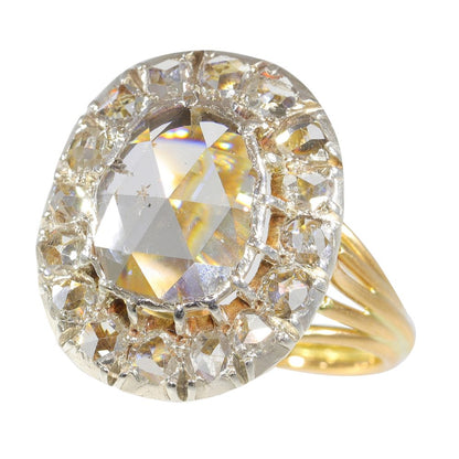 Antique diamond engagement ring in gold and silver
