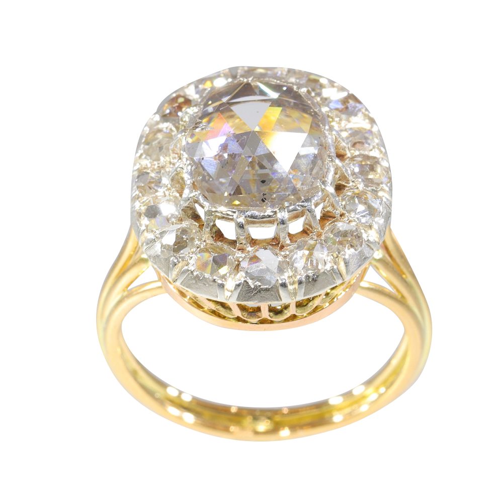 Antique diamond engagement ring in gold and silver