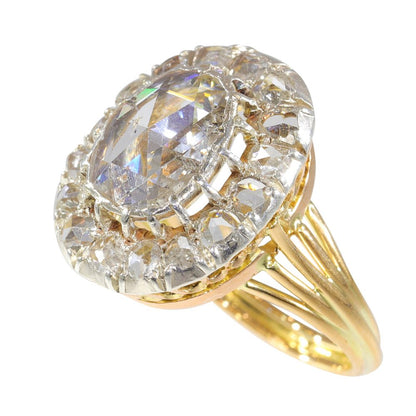 Antique diamond engagement ring in gold and silver