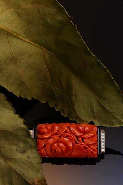 Art Deco Carved Coral Brooch with Onyx and Diamonds