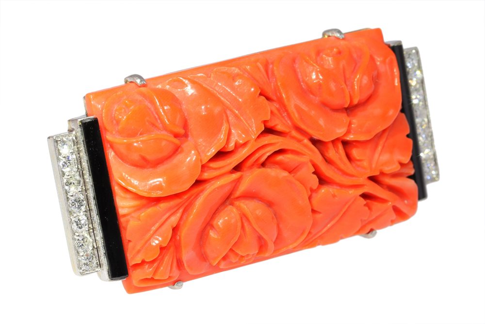 Art Deco Carved Coral Brooch with Onyx and Diamonds