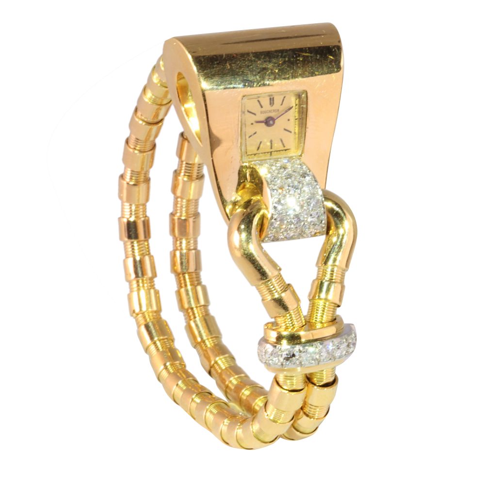 Iconic Vintage Boucheron Diamond Set Gold and Platinum Fan Watch, 18ct yellow gold with details in platinum set with 41 brilliant-cut diamonds totalling 1.86 carats. Circa 1950s. Signed Boucheron, Paris