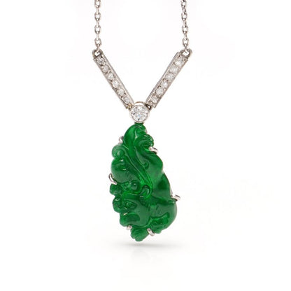 Art Deco Carved Jade and Old Cut Diamond Necklace in Platinum; set with a GIA certified natural A grade jade carving pendant and diamonds, Circa 1920s