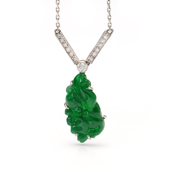 Art Deco Carved Jade and Old Cut Diamond Necklace in Platinum; set with a GIA certified natural A grade jade carving pendant and diamonds, Circa 1920s