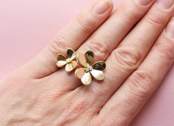 Van Cleef and Arpels 18ct Yellow Gold Frivole Flower Ring; comprising two diamond set flowers, Signed Van Cleef en Arpels, Numbered E271013