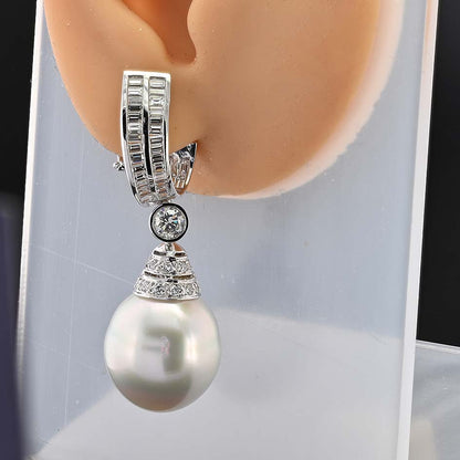 South Sea Pearl and 3.70ct Diamond Drop Earrings by Ella Gem, Two large South Sea pearls with diamond caps suspended from baguette diamond tops via diamond solitaire links in 18ct white gold