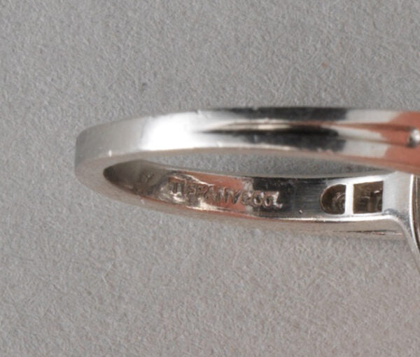 Tiffany and Co Vintage 1950s Diamond Circular Cluster Ring, 1.75 carat total, in platinum and iridium, Signed