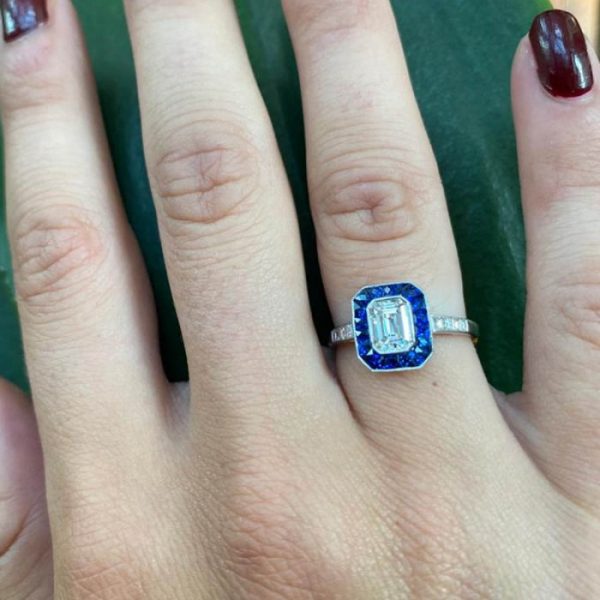 0.69ct Emerald Cut Diamond and Sapphire Cluster Ring, set in platinum