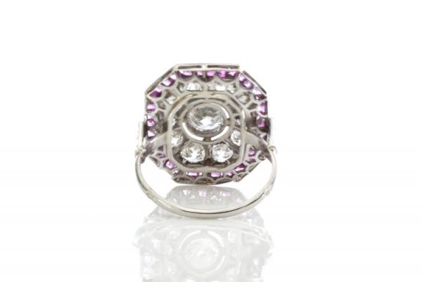 Late Art Deco Diamond, Ruby and Platinum Cluster Ring; with 1.45cts old and brilliant-cut diamonds and 0.68cts square cut rubies, Circa 1930