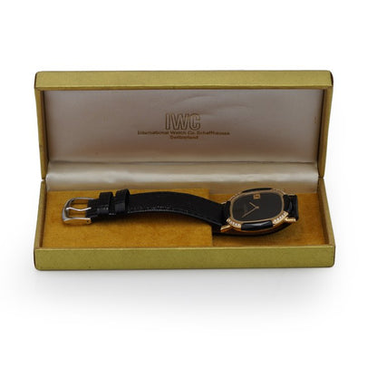 Vintage ladies IWC Schaffhausen 18ct Yellow Gold Watch with Black Face and Diamond and Onyx Bezel, Ref 2232671