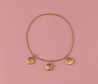 Antique Victorian Faith Hope and Love Gold Necklace; snake chain with three removable lockets featuring the cross, anchor and heart symbols, removable glass at the back to keep a photo or hair of a loved one. England, 19th century