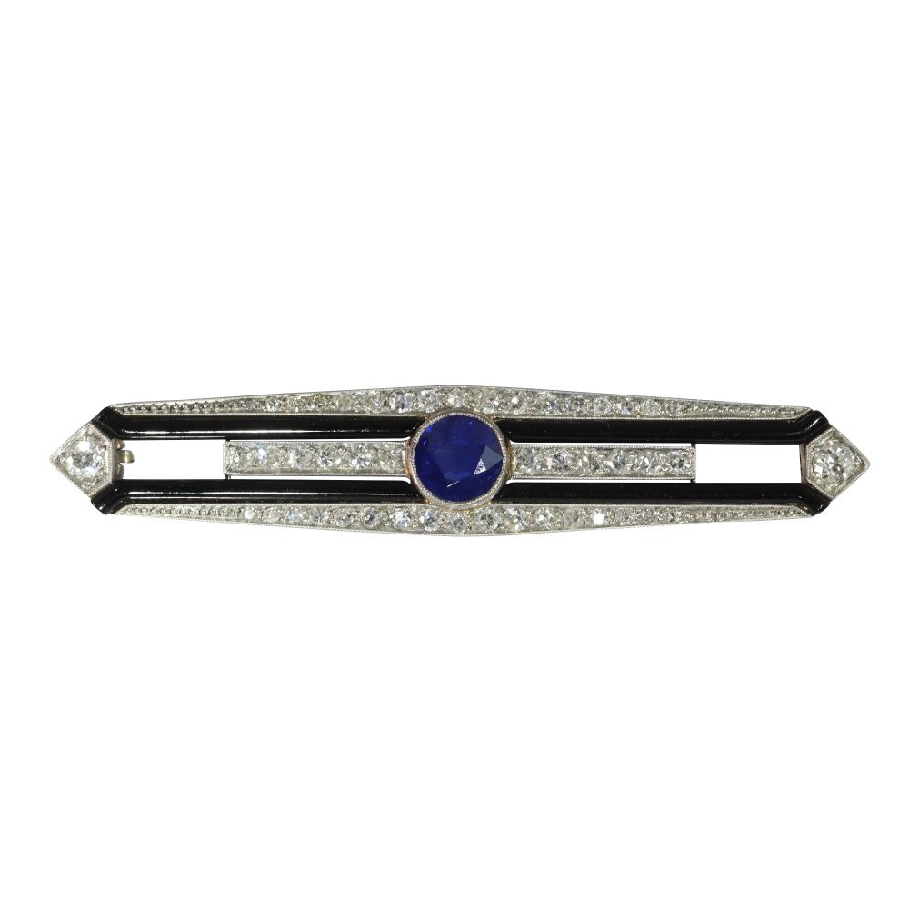Art Deco diamond, sapphire and onyx bar brooch in white gold.