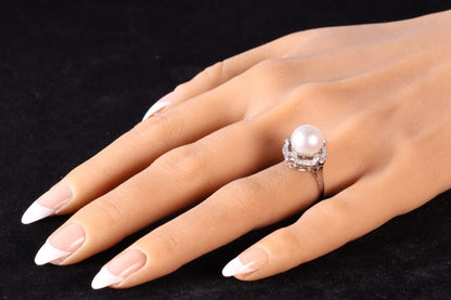 Art Deco Pearl And Old Cut Diamond Ring In Platinum