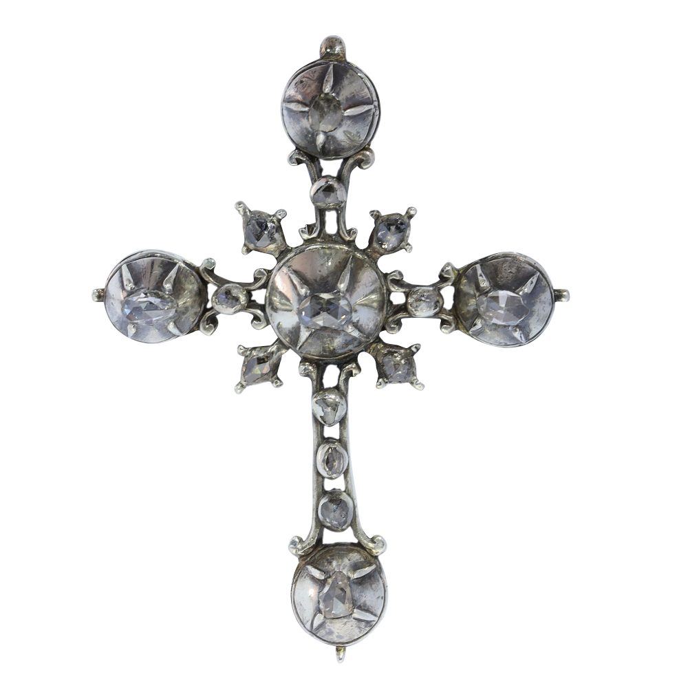 Rococo silver cross diamond set pendant.