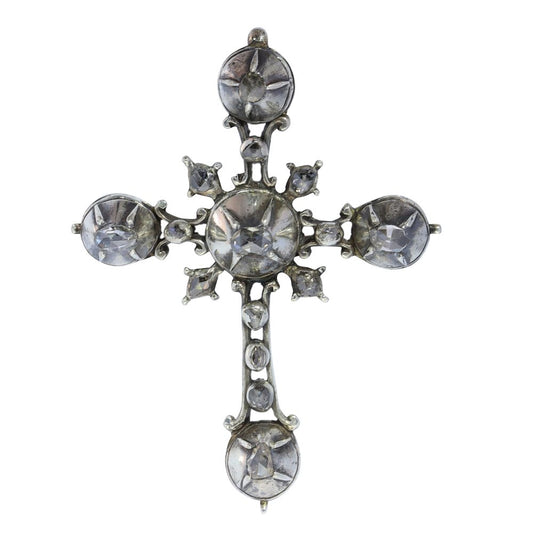 Rococo silver cross diamond set pendant.