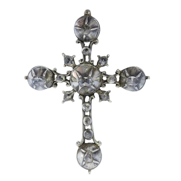 Rococo silver cross diamond set pendant.