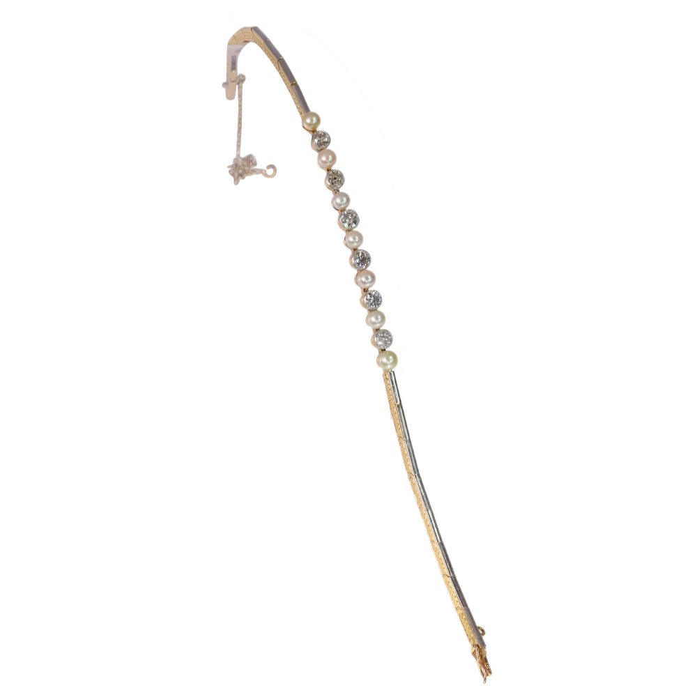 Art Deco diamond and pearl bracelet in white and yellow gold.