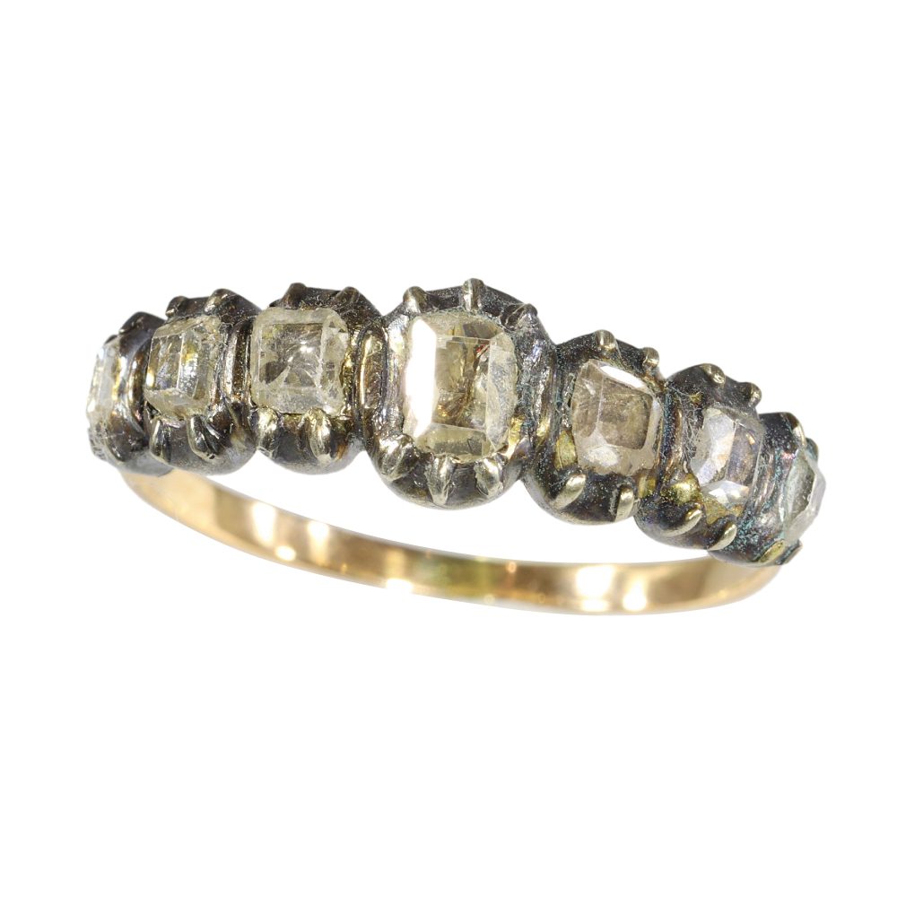 Antique Baroque diamond ring in gold and silver.