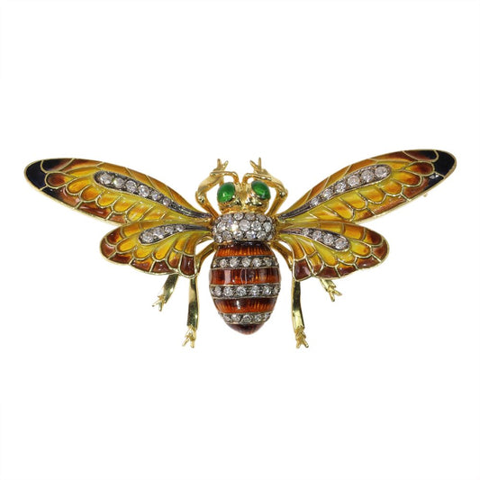 Vintage diamond bee brooch/pendant in gold.