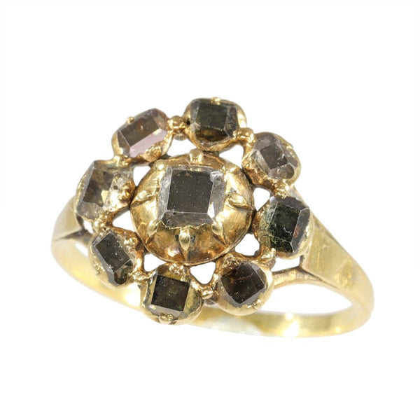 400 year old diamond cluster ring in gold