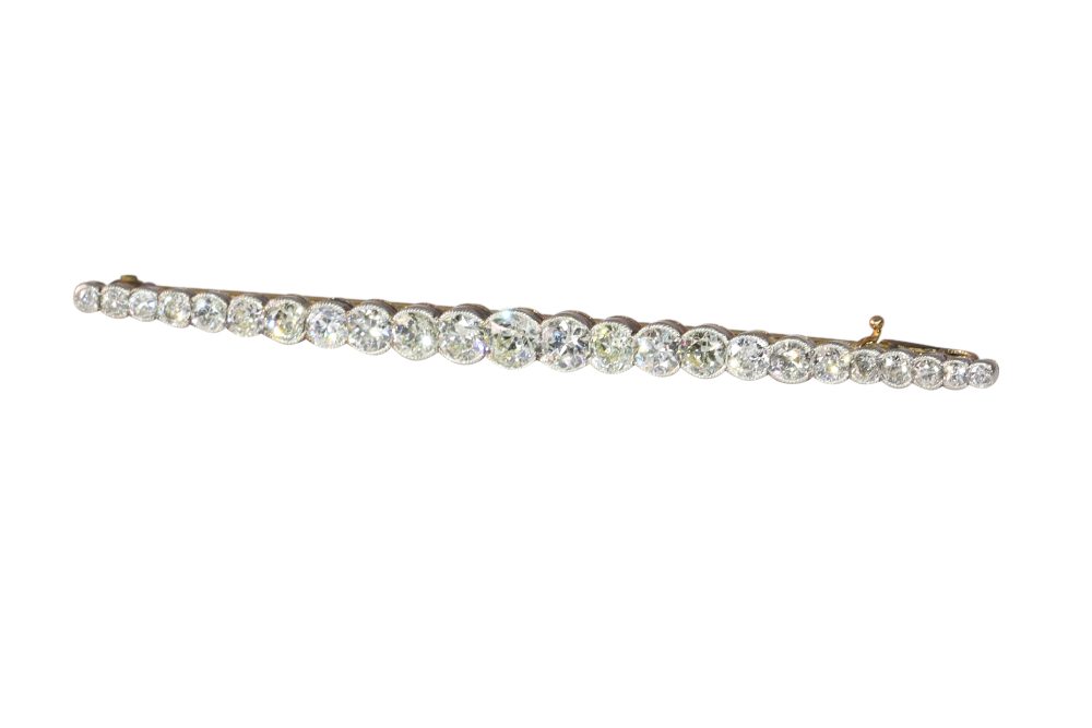 Art Deco Bar Brooch In Yellow Gold And Platinum With Old Cut Diamonds