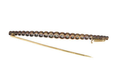 Art Deco Bar Brooch In Yellow Gold And Platinum With Old Cut Diamonds