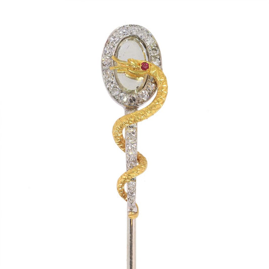 Vintage diamond and ruby stickpin in gold.