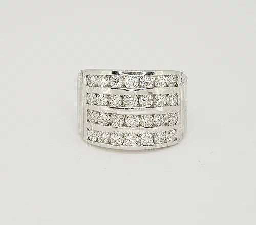 Channel Set Diamond Dress Ring; featuring four horizontal rows channel set with 2.00 carats brilliant cut diamonds, ribbed shoulders, in 18ct white gold